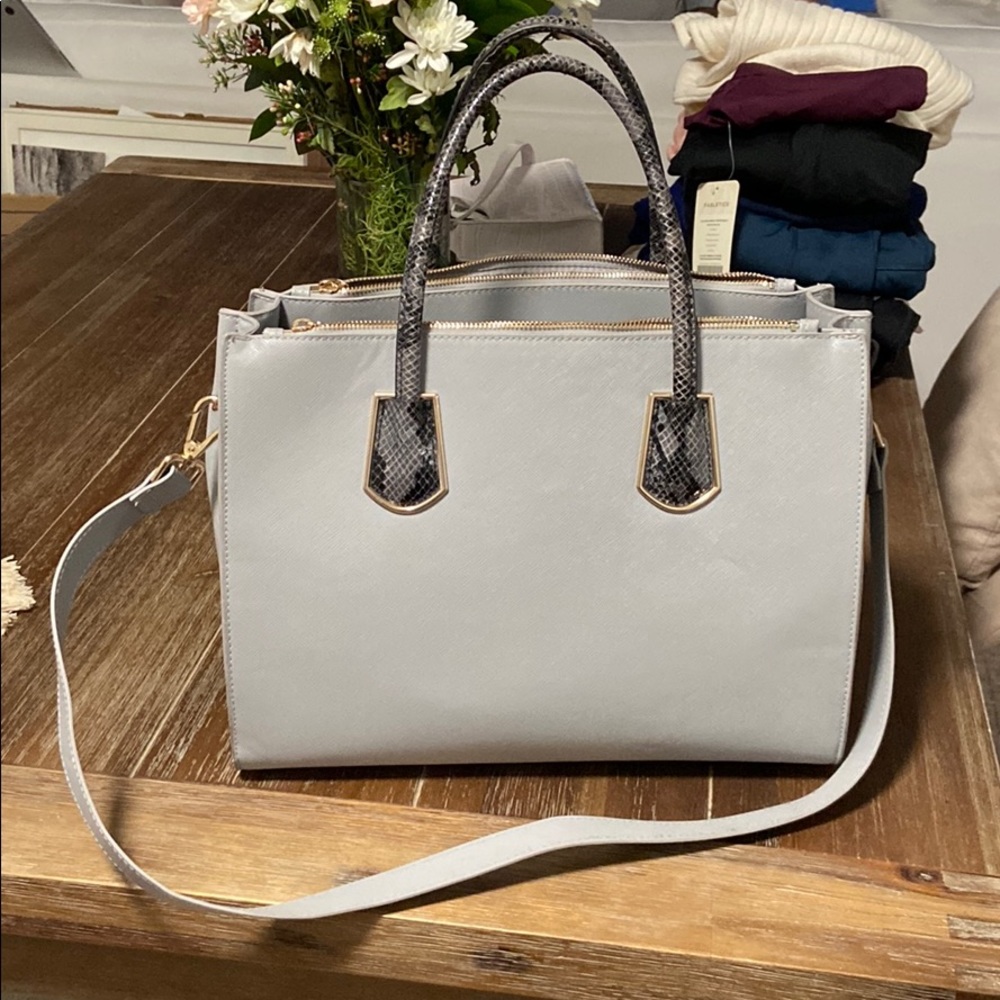 Light blue large tote. Snakeskin handles